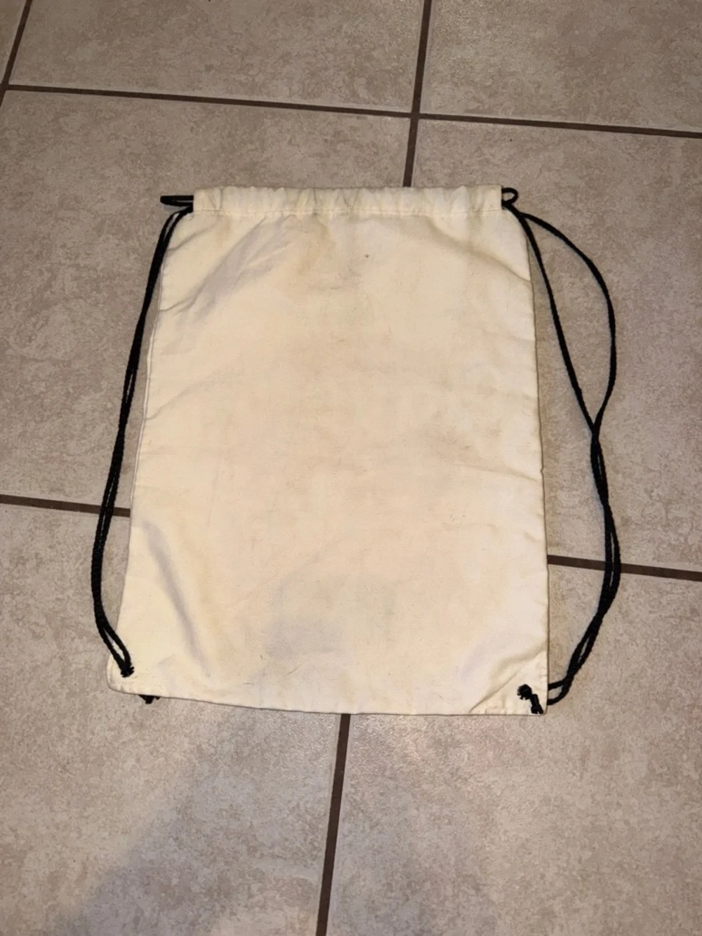 Cream Drawstring Backpack with Red Graphic